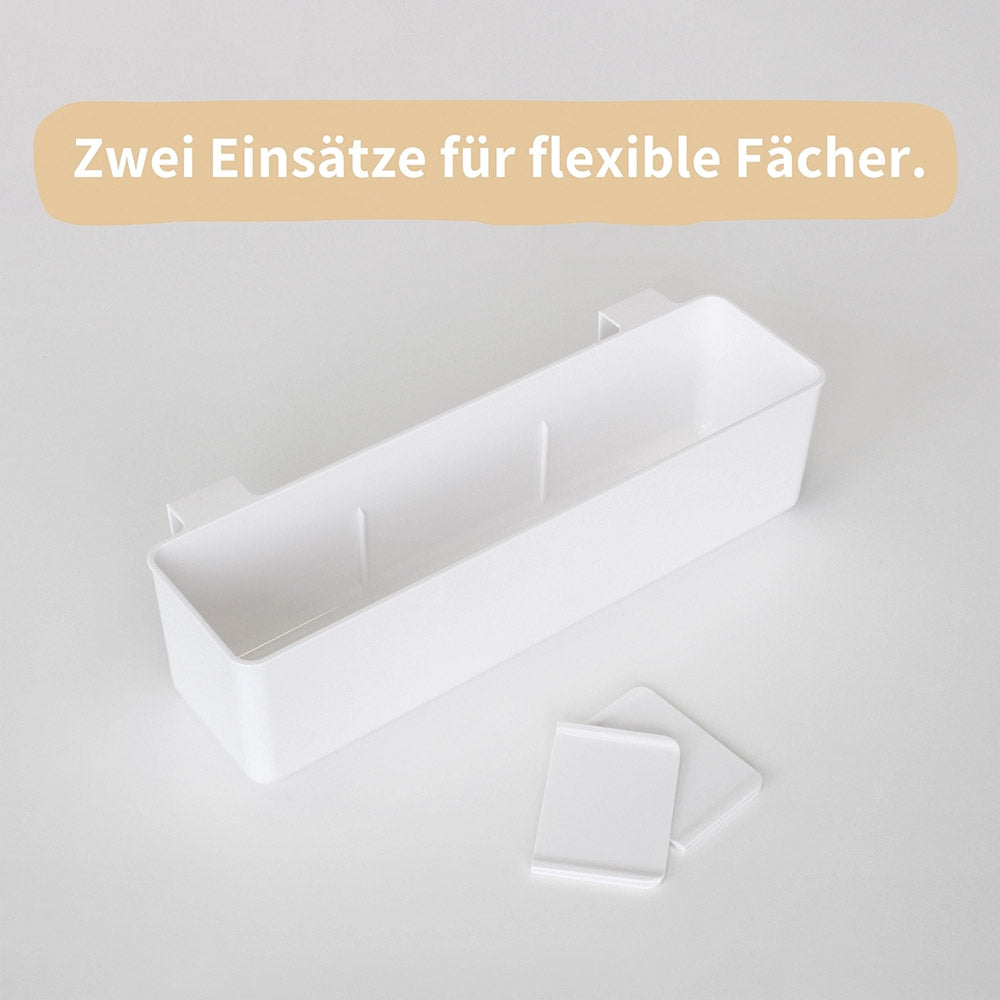 Weißer Wickeltisch Organizer mit Hängevorrichtung und herausnehmbaren Wänden für eine Wickelkommode.